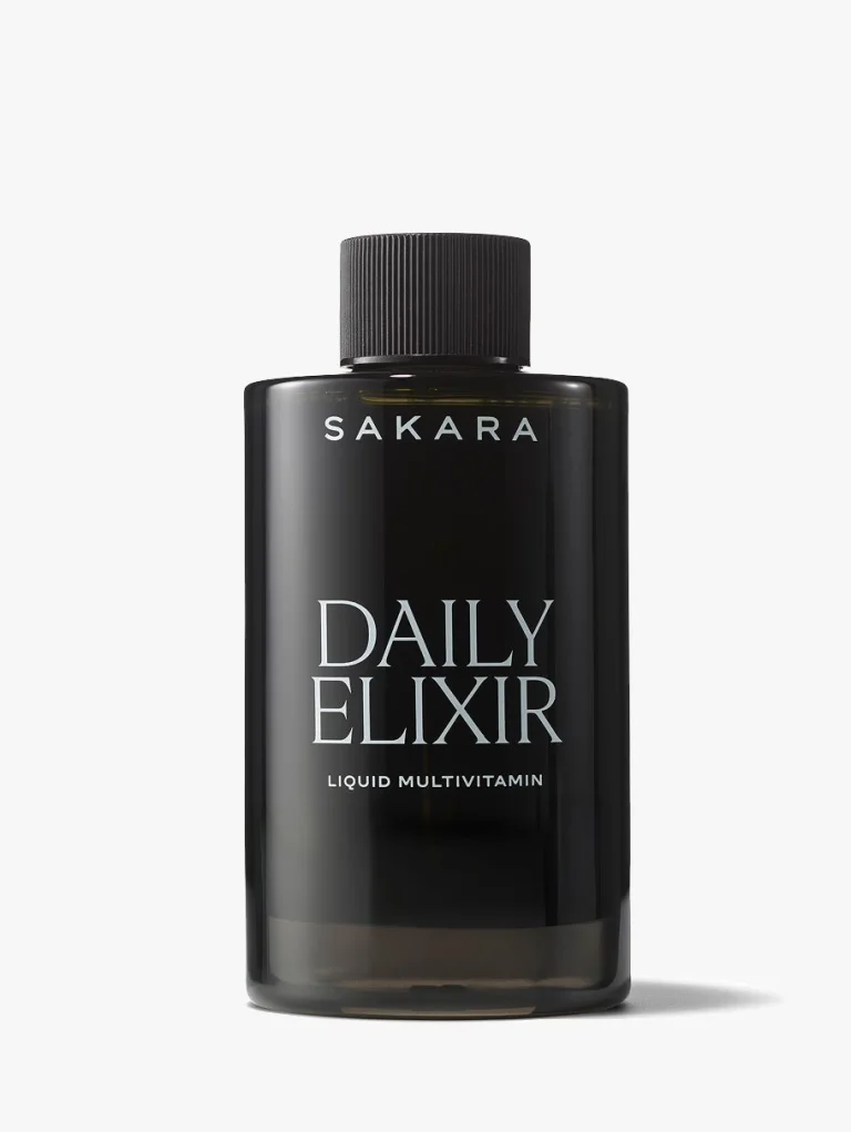 Sakara Daily Elixir liquid multivitamin deluxe sample in dark translucent bottle with black cap, 3.25 fl oz.