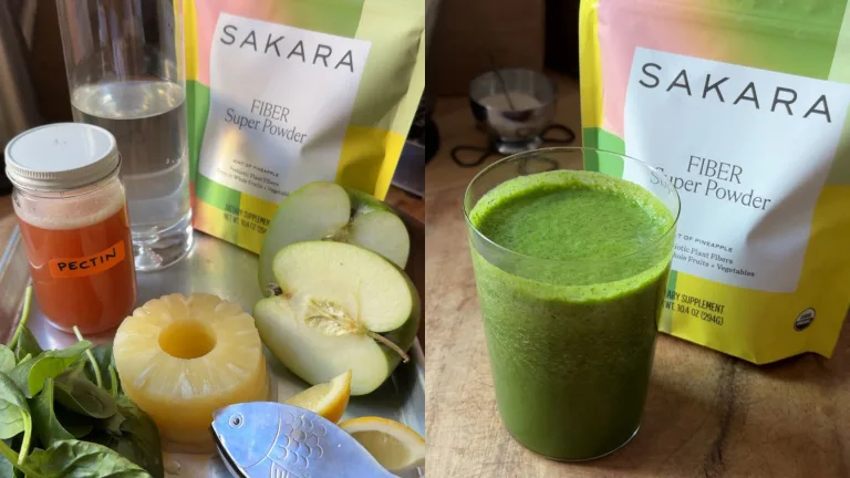 Glass of green smoothie beside Sakara Fiber Super Powder pouches, apple slices, pineapple, and greens.