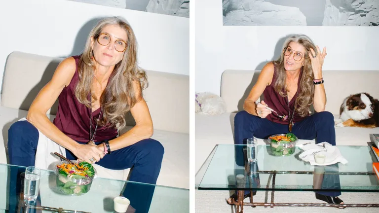 Wellness in the Schools Founder, Nancy Easton, seated at a glass coffee table with a Sakara salad.