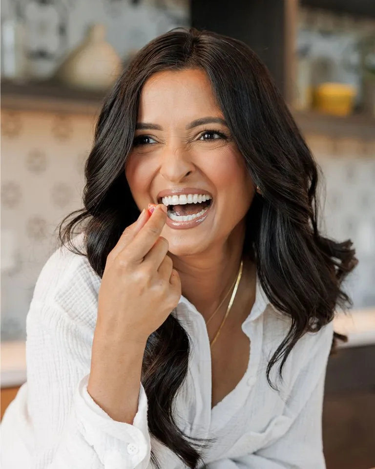 Chef Palek Patel portrait smiling in her kitchen.